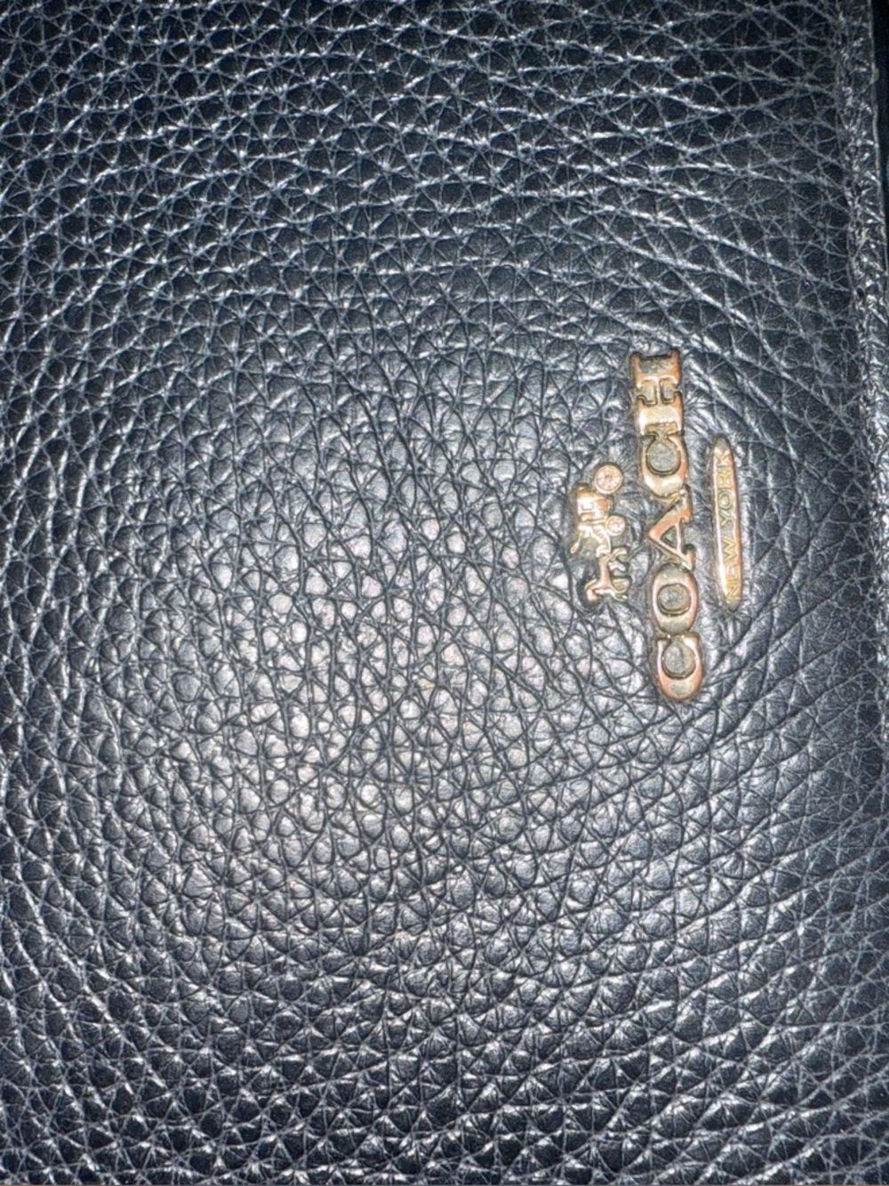 COACH Black Pebbled Leather women’s clutch with Gold Logo Accent